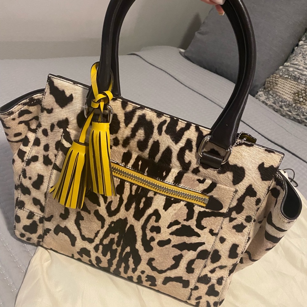 NWT Coach Legacy Ocelot Haircalf Carryall Bag 21165
Retail: $1400